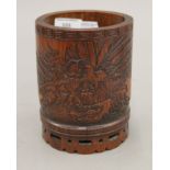 A Chinese bamboo brush pot carved with warrior, eagle and mountain scenery. 14.5 cm high.