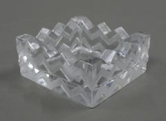 A Lalique France glass ashtray. 11 cm square.