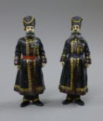 A pair of bronze Russian figures. 18 cm high.