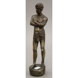 A silvered copper model of a semi clothed male. 28.5 cm high.