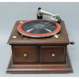 An HMV mahogany hornless gramophone, with exhibition sound box, circa 1915. 44 cm wide.