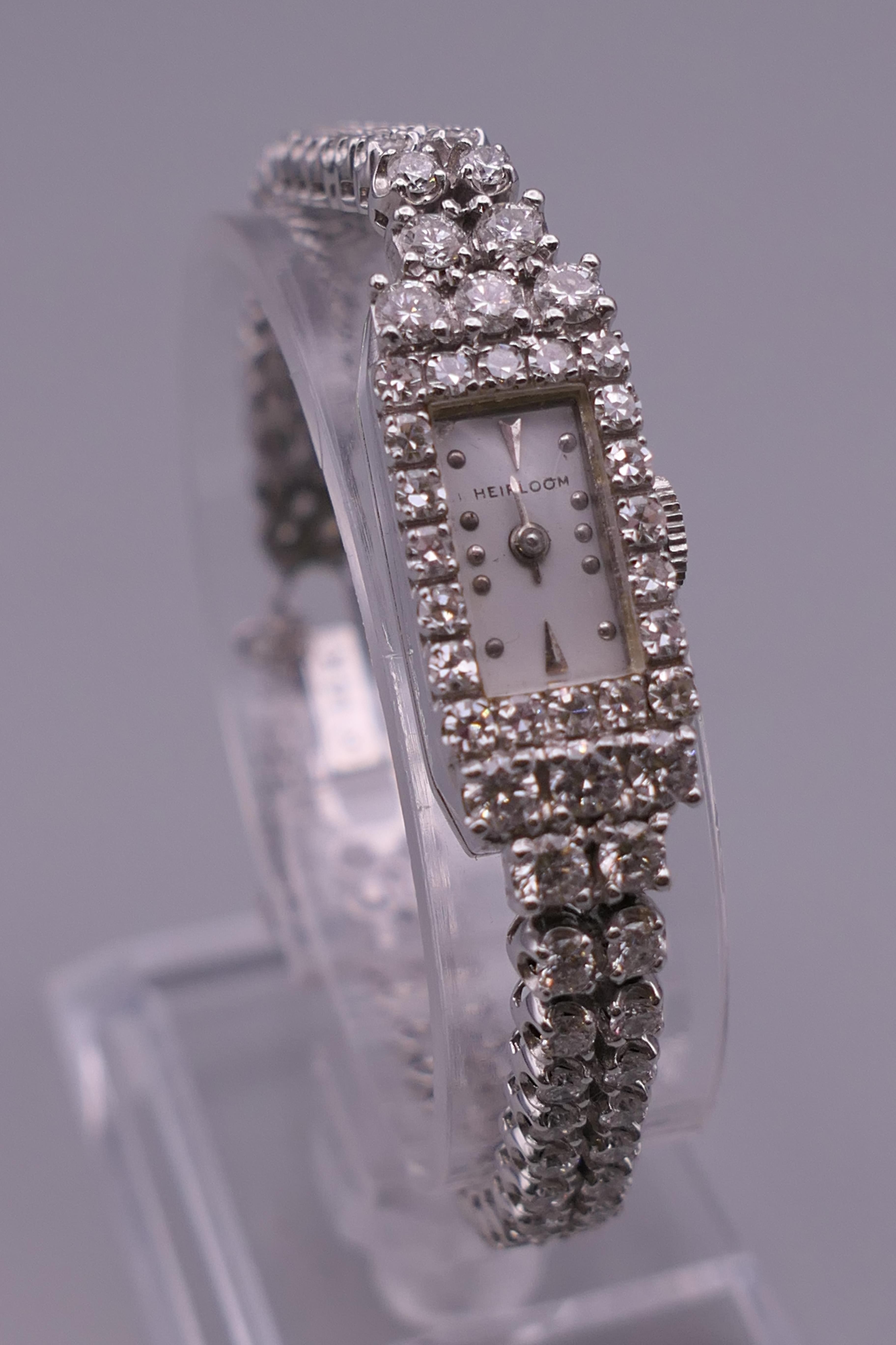 A 14 ct white gold ladies diamond set cocktail watch. 1 cm wide. 24.7 grammes total weight. - Image 3 of 8