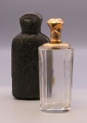 A cased Continental unmarked gold topped glass scent bottle. 9.5 cm high overall.