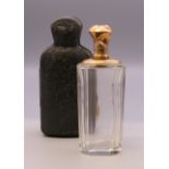 A cased Continental unmarked gold topped glass scent bottle. 9.5 cm high overall.