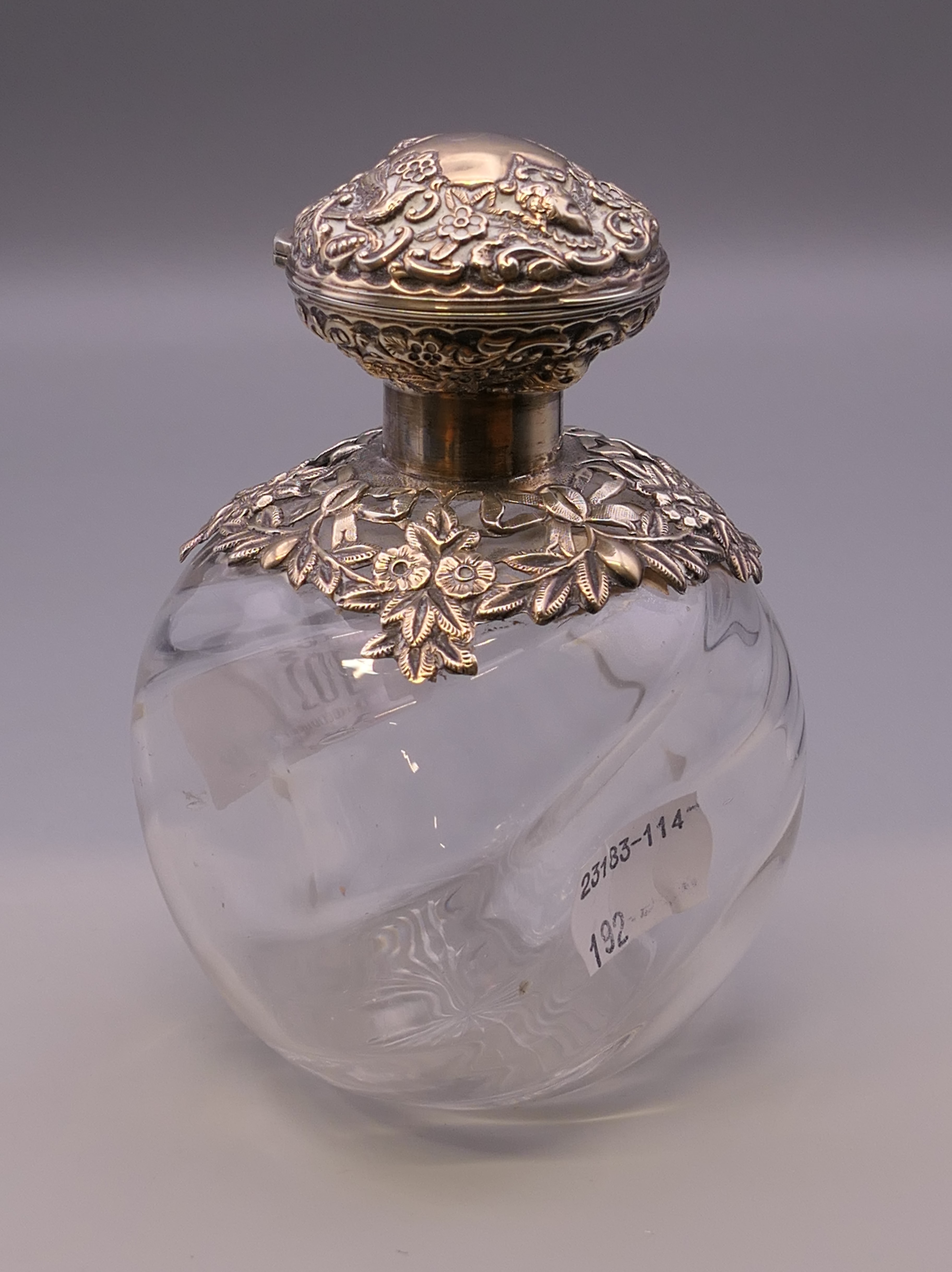 A silver topped bulbous perfume bottle. 12 cm high. - Image 3 of 7