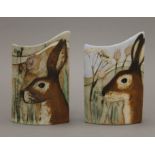 DENISE BROWN (20th/21st century), a pair of Studio Pottery vases decorated with hares. 16.5 cm high.