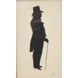 A framed silhouette of a gentleman. 17.5 x 25 cm overall.