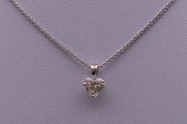 An 18 ct white gold diamond pendant, the heart shaped diamond approximately 1.