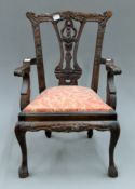 An 18th century style doll's chair. 50.5 cm high.