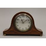 An Edwardian inlaid mahogany mantle clock. 21 cm wide.
