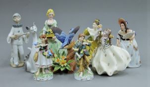 A quantity of porcelain figurines, etc.