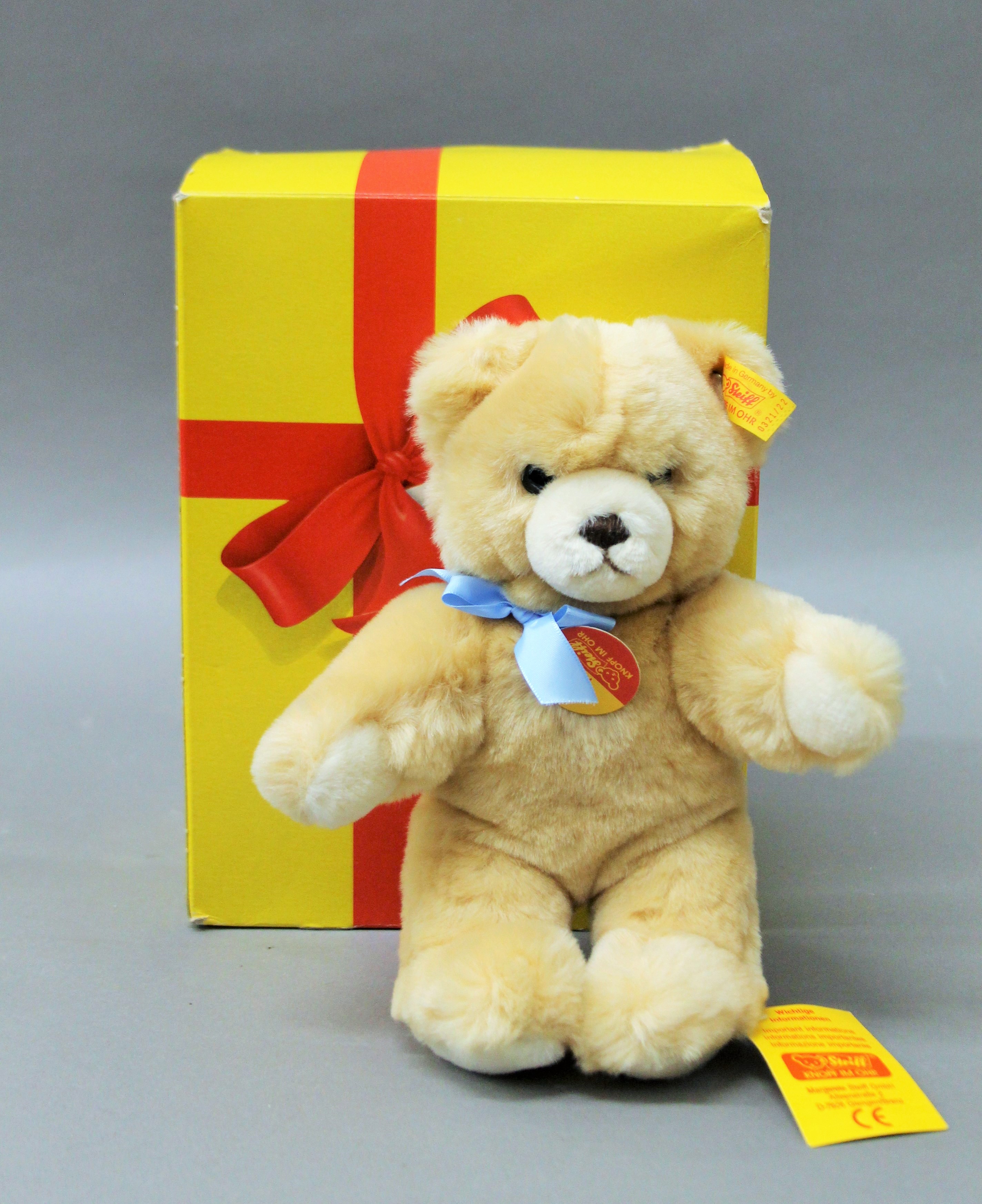 A boxed Steiff teddy bear.