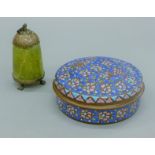 A Middle Eastern circular copper spice box with brightly enamelled lid and tinned interior,