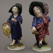 Two Continental porcelain figurines. The largest 12 cm high.