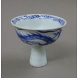 A Chinese blue and white porcelain stem cup. 9 cm high.