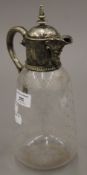 A silver plated Baccarat glass claret jug. 26 cm high.