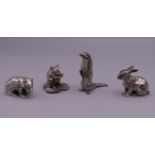 Four silver plated model animals. The largest 4.5 cm high.