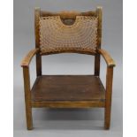 A caned child's chair. 52 cm wide.