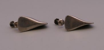 A pair of Georg Jensen silver earrings. 2.5 cm high.