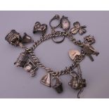 A silver charm bracelet. 39.9 grammes.