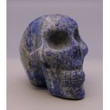 A lapiz model of a skull. 6 cm high.