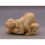 A bone erotic carving. 5 cm long.