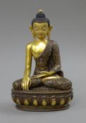 A painted face bronze model of Buddha. 21.5 cm high.