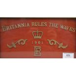 A fret cut plaque, inscribed ''Britannia Rules the Waves''. 30.5 x 18 cm.