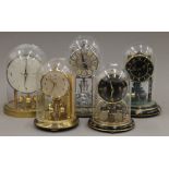 Five various anniversary clocks.