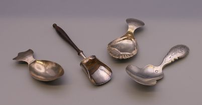 Four silver caddy spoons. 33.3 grammes total weight.