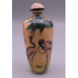 A signed Canton cloisonne snuff bottle decorated with storks. 6.5 cm high.
