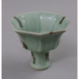 A celadon stem cup. 10.5 cm high.