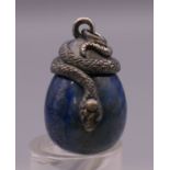 A silver and lapiz egg form pendant. 3 cm high.