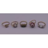 Five 9 ct gold stone set rings. 9.9 grammes total weight.