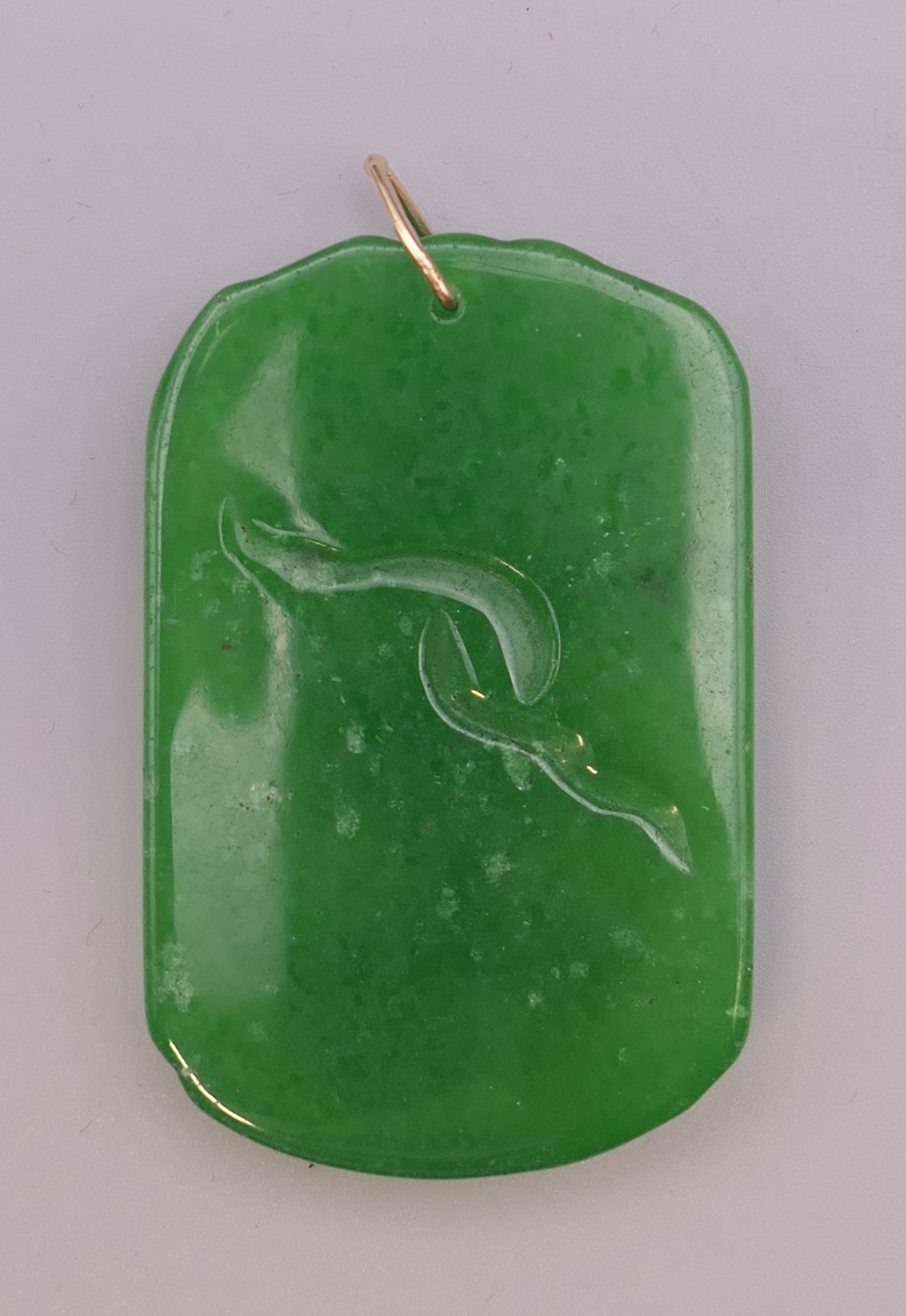 A gold mounted apple green jade pendant. 6 cm high. - Image 4 of 4