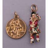 A 9 ct gold charm formed as a bag piper and a 9 ct gold St Christopher charm. 3.