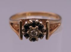 A 9 ct gold diamond and sapphire ring. Ring size N/O. 2.8 grammes total weight.