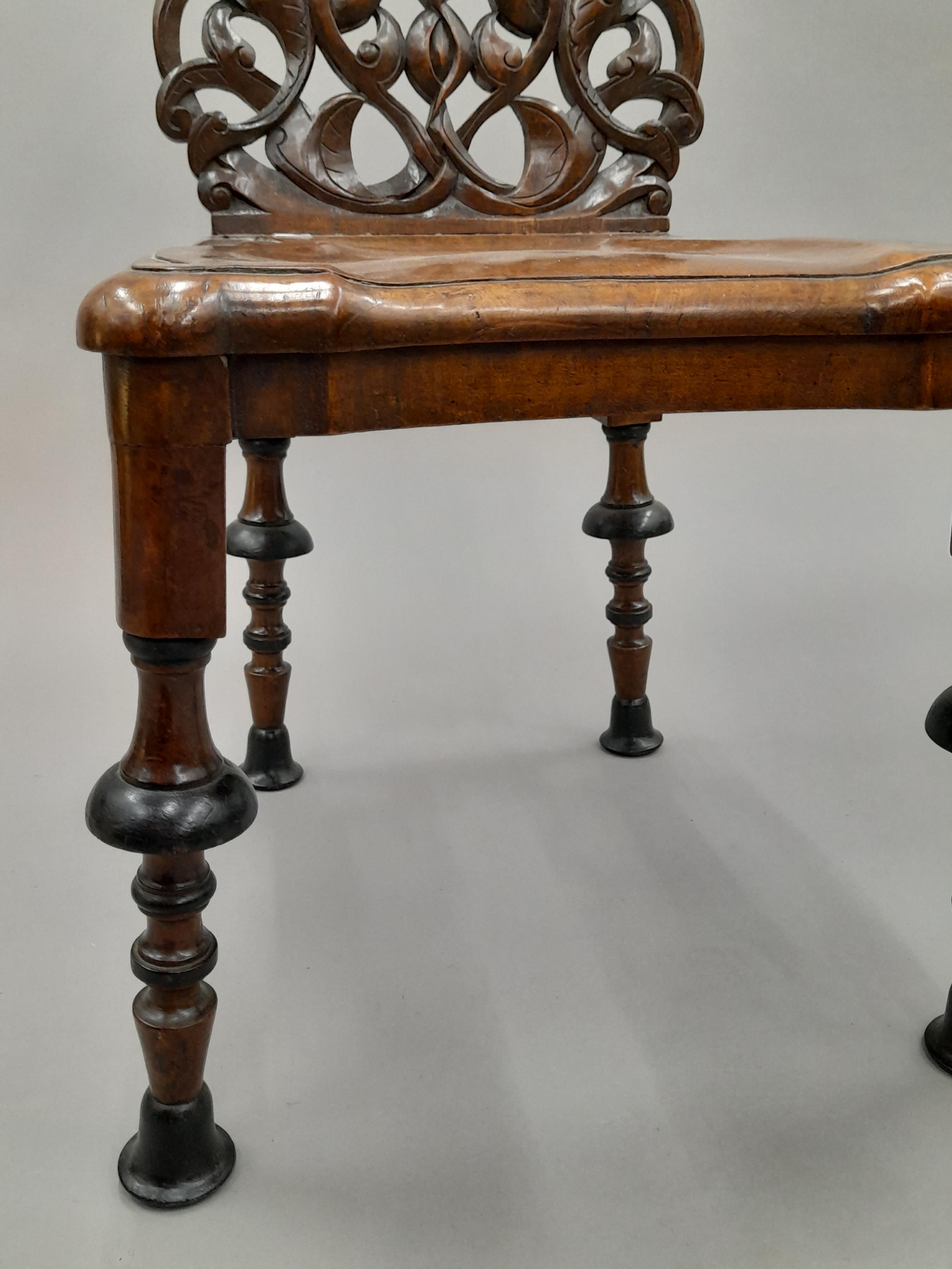 A 19th century carved hall chair. 39 cm wide. - Image 6 of 7