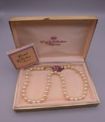 A Trifari pearl necklace. 45 cm long.