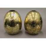Two Victorian engraved brass finials. 23 cm high.