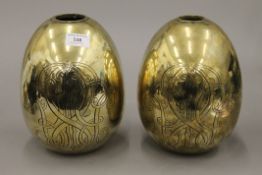 Two Victorian engraved brass finials. 23 cm high.