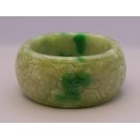 A jade napkin ring. 5 cm diameter.