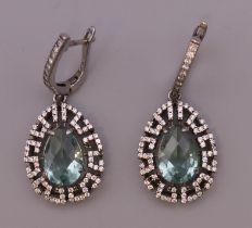 A pair of silver dress earrings. 3.75 cm high.