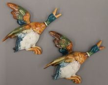 Two Beswick porcelain Mallard wall plaques. The largest 22 cm long.