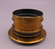 An antique brass bound Cooke camera lens H.D Taylor's Patents Series 111 6.5 x 4.75 EQ focus 7.