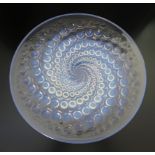 An R Lalique France Volutes pattern glass plate. 27 cm diameter.