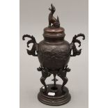 A Japanese patinated bronze censer. 37 cm high.