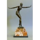 An Art Deco style bronze model of a dancer. 49 cm high.