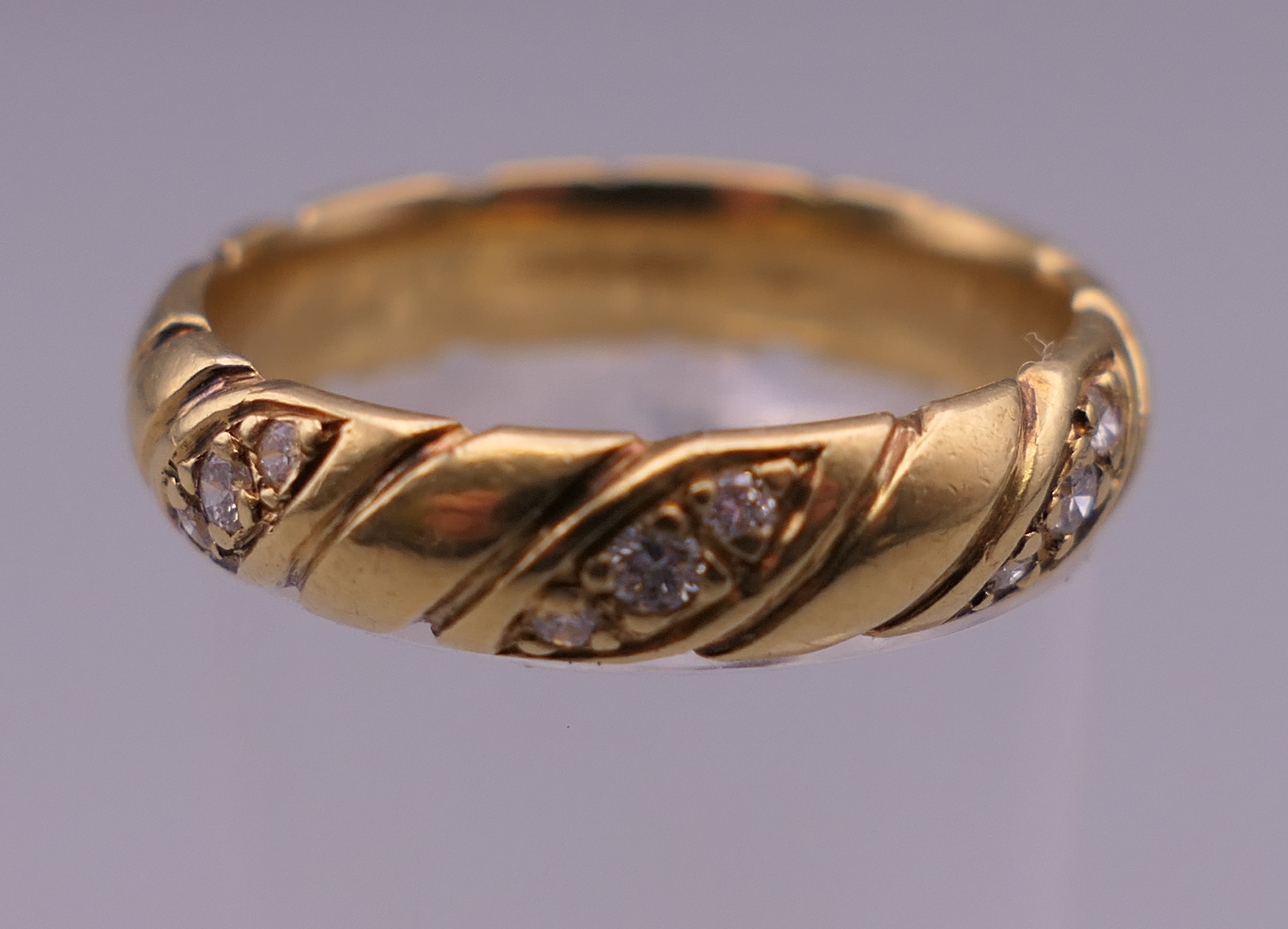 An 18 ct gold diamond set ring. Ring size P. 6.6 grammes total weight. - Image 2 of 10