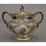 A 19th century French glass and silver plated sugar bowl decorated with figural vignettes. 16.